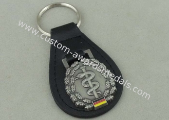La Germania ha personalizzato le catene chiave di cuoio, anello portachiavi molle d'argento antico in lega di zinco dello smalto